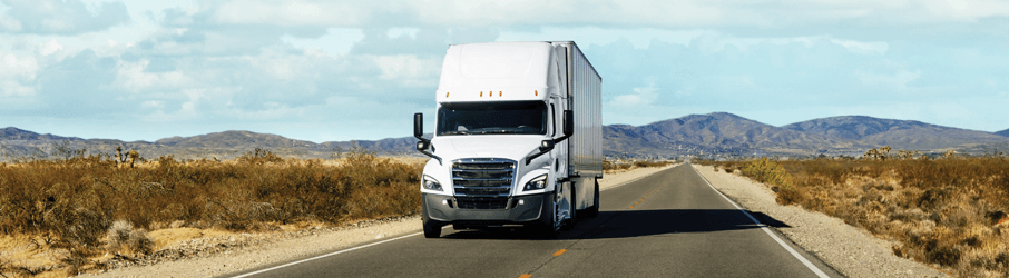 White Penske tractor trailer on a highway